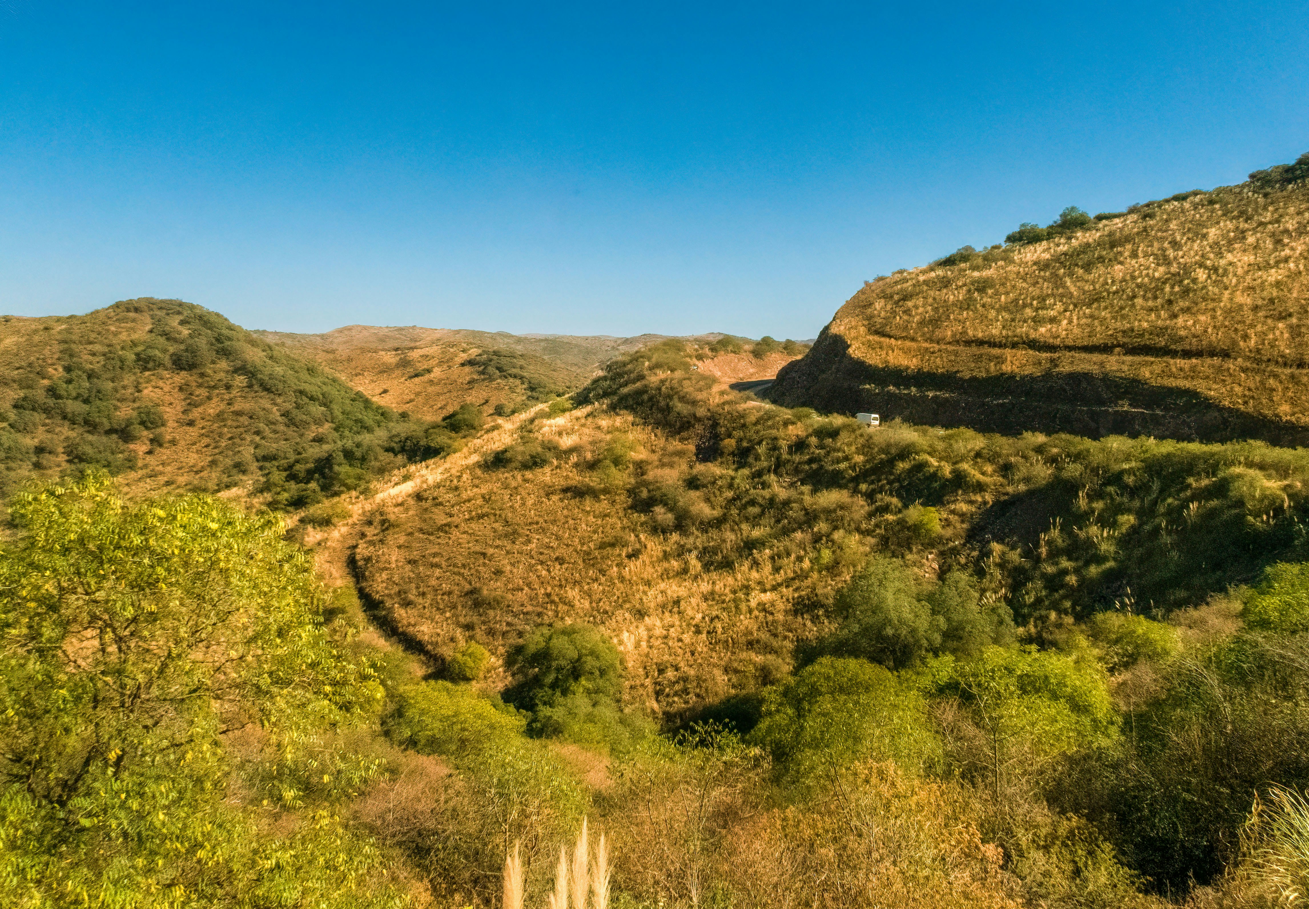 a landscape with hills and trees