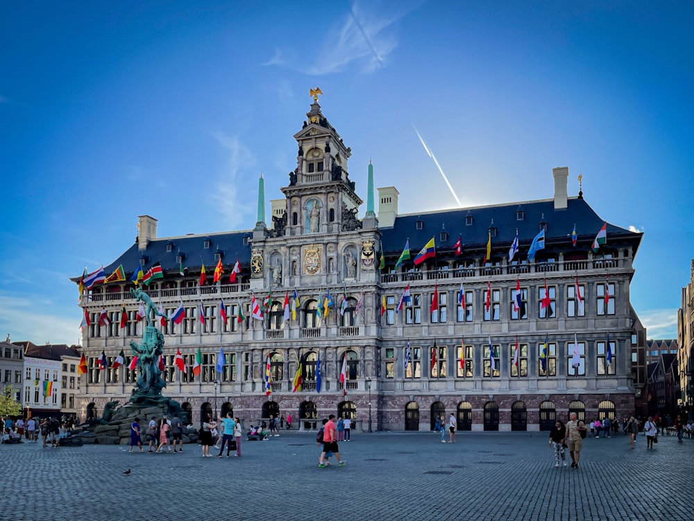 a large building with a statue in front of it