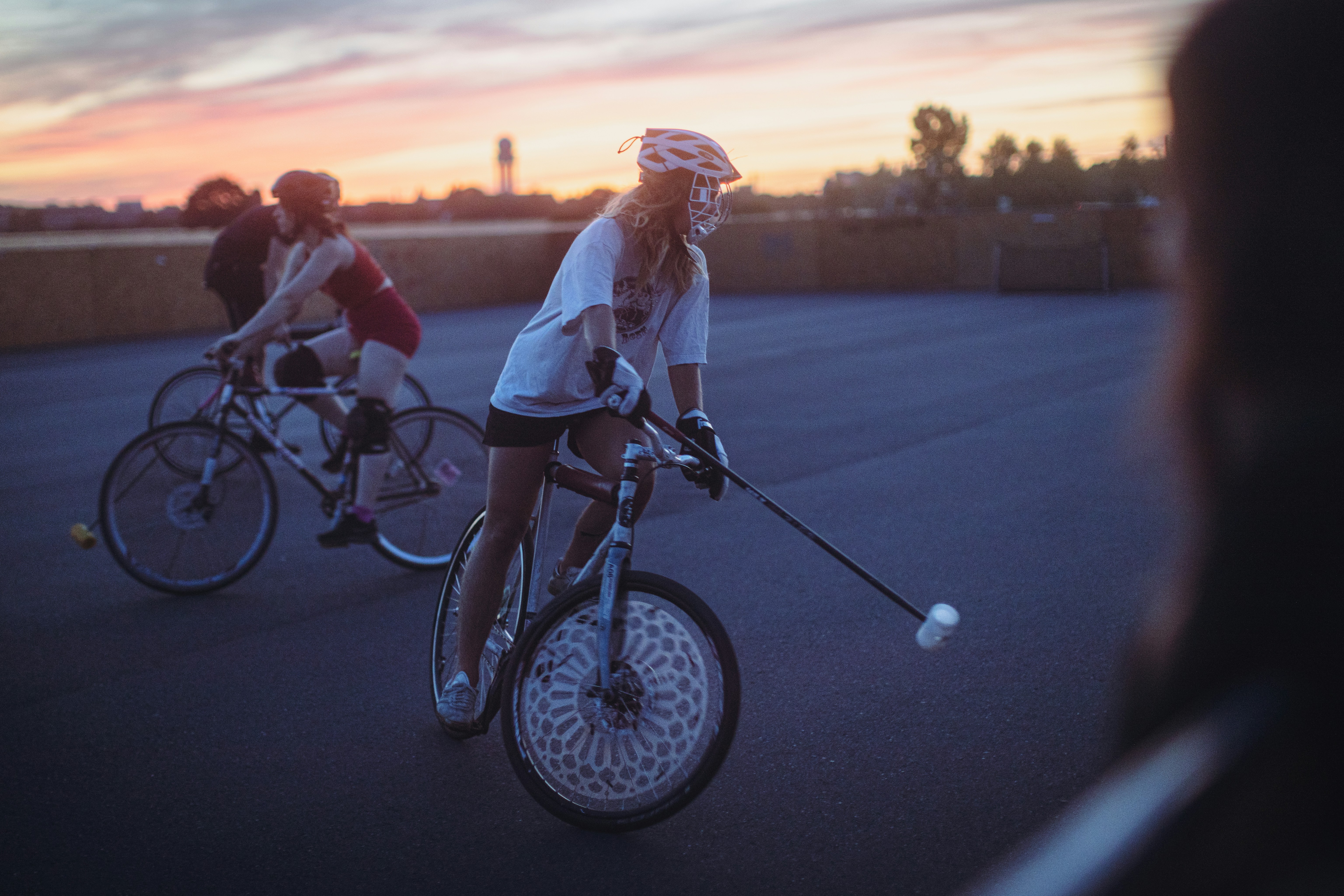 a group of people riding bikes