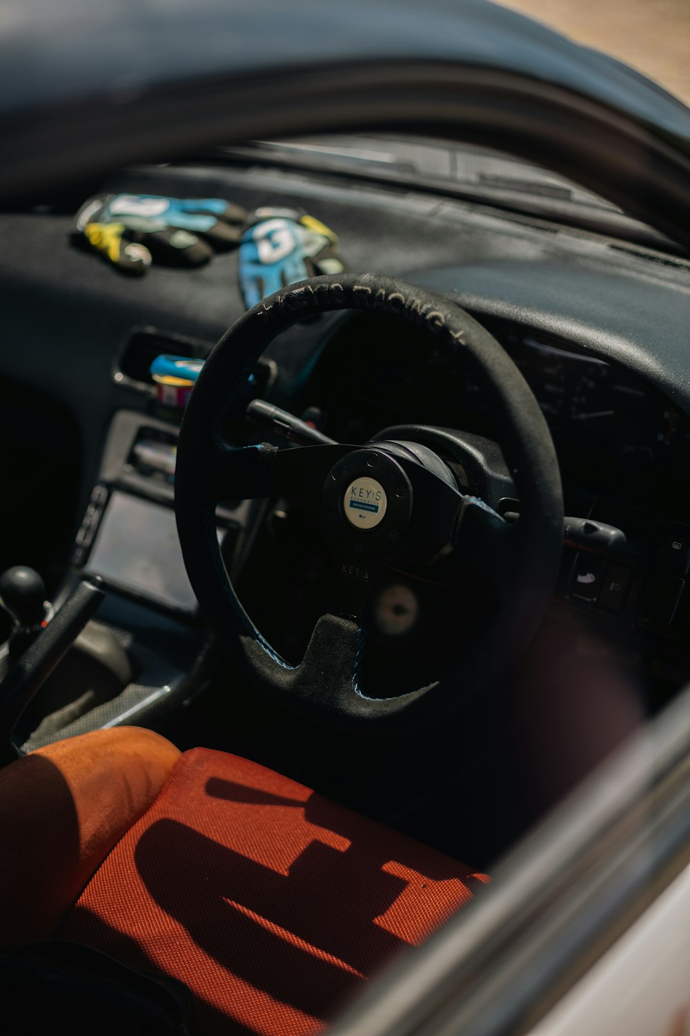 a steering wheel and dashboard of a car