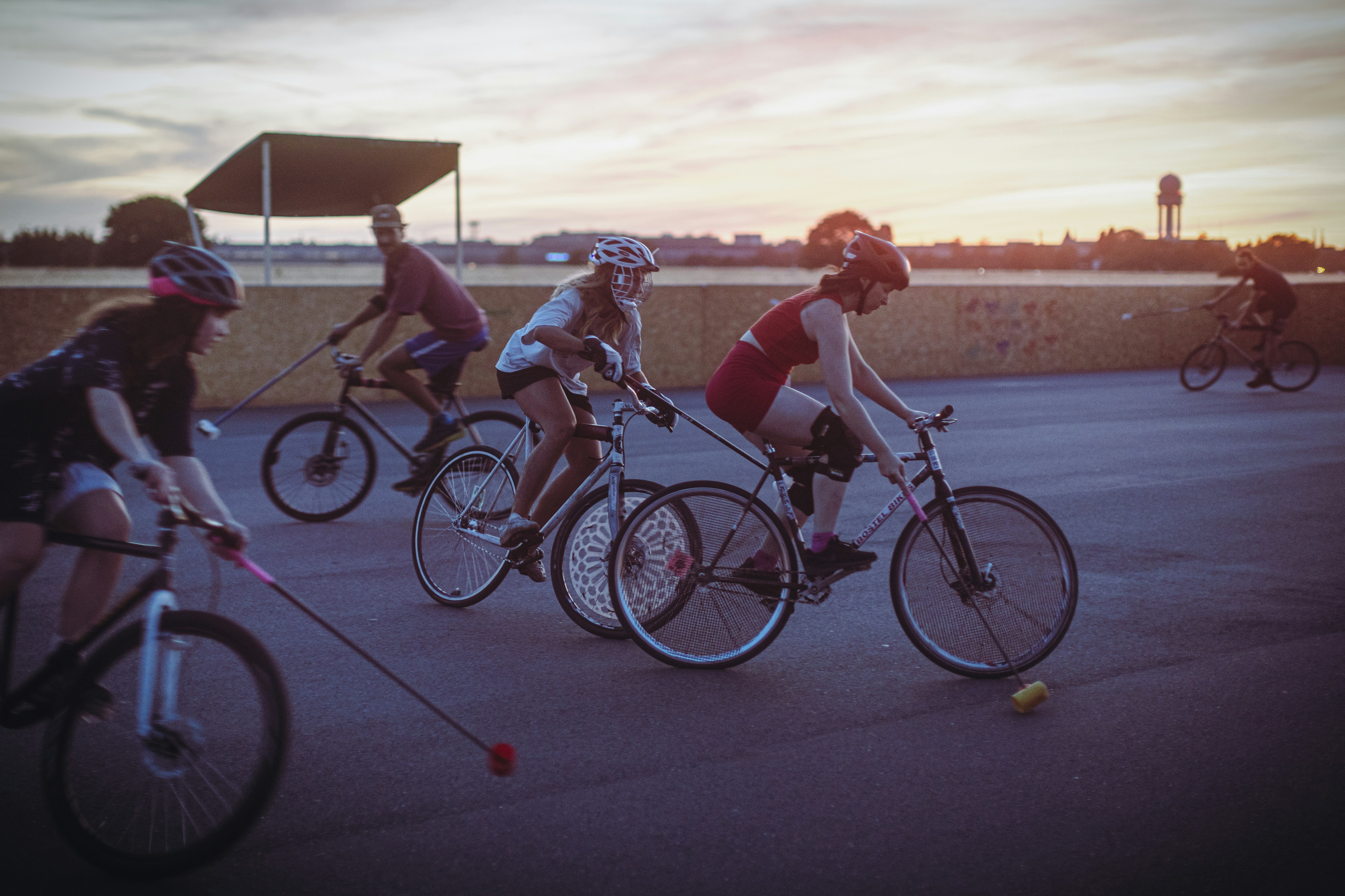 a group of people riding bikes