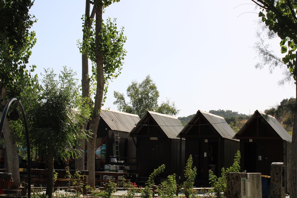 a group of buildings with trees around