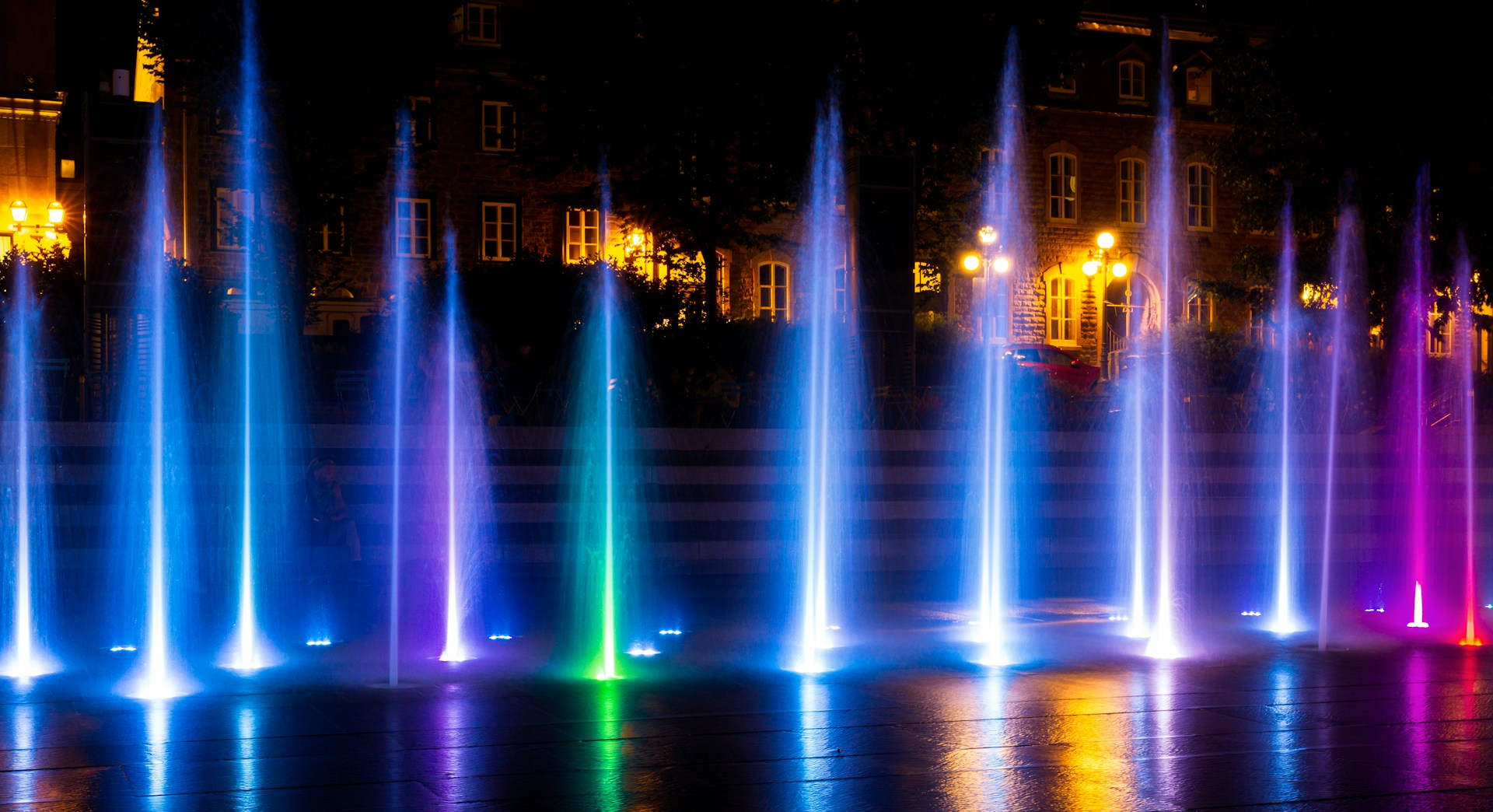 a fountain with colorful lights
