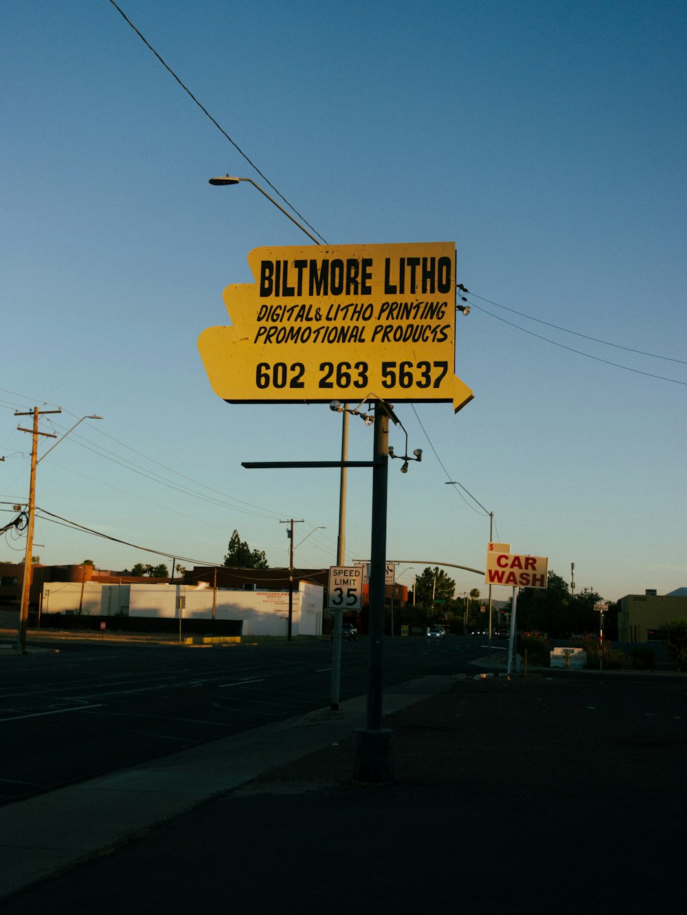 a sign on the side of a road