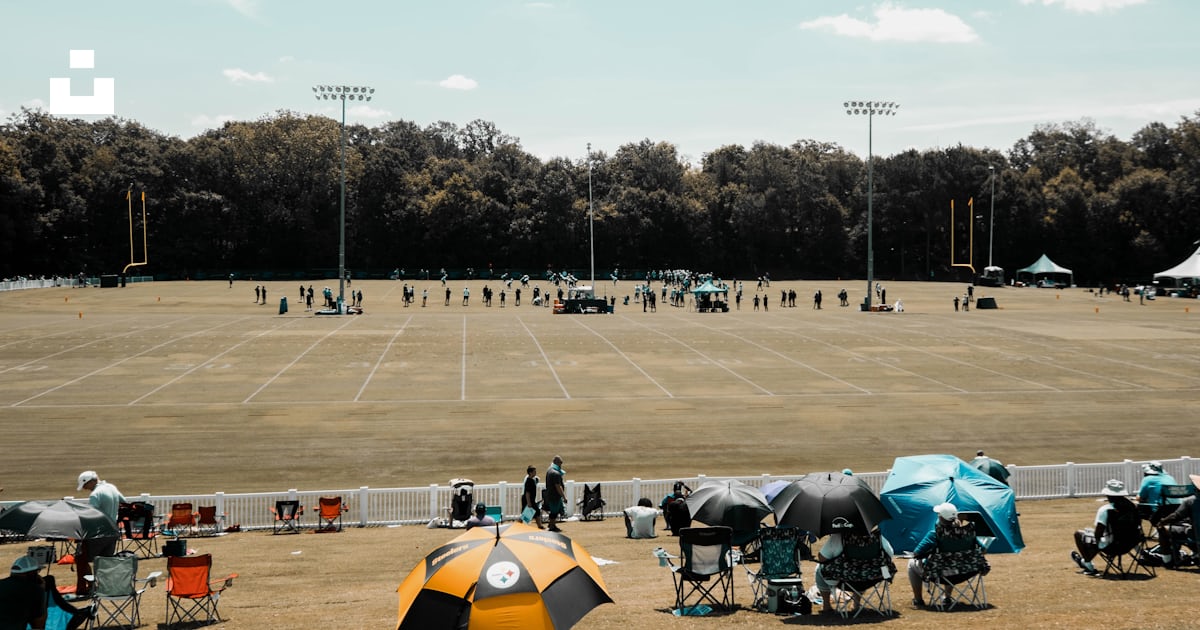 A group of people at a race track photo – Free Wofford college Image on ...
