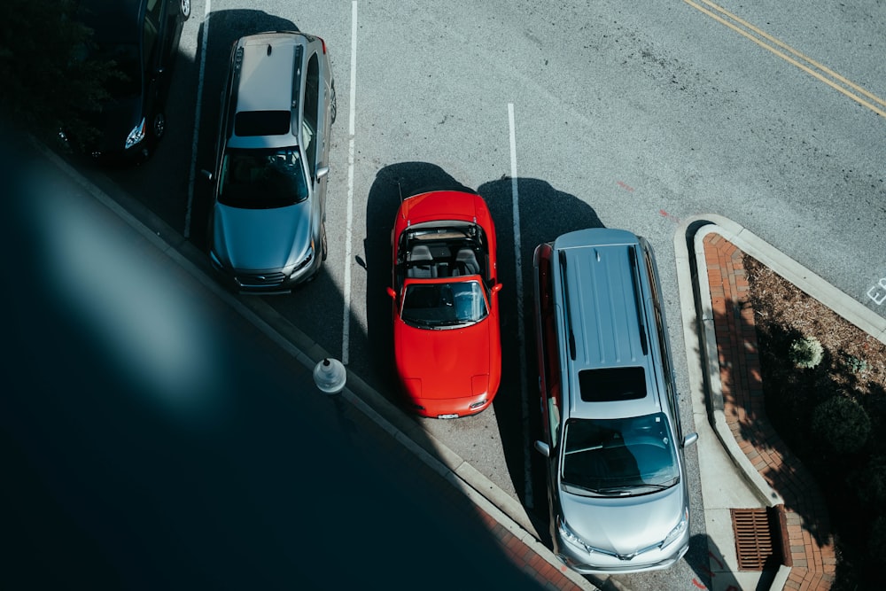 a group of cars parked on the side of a road