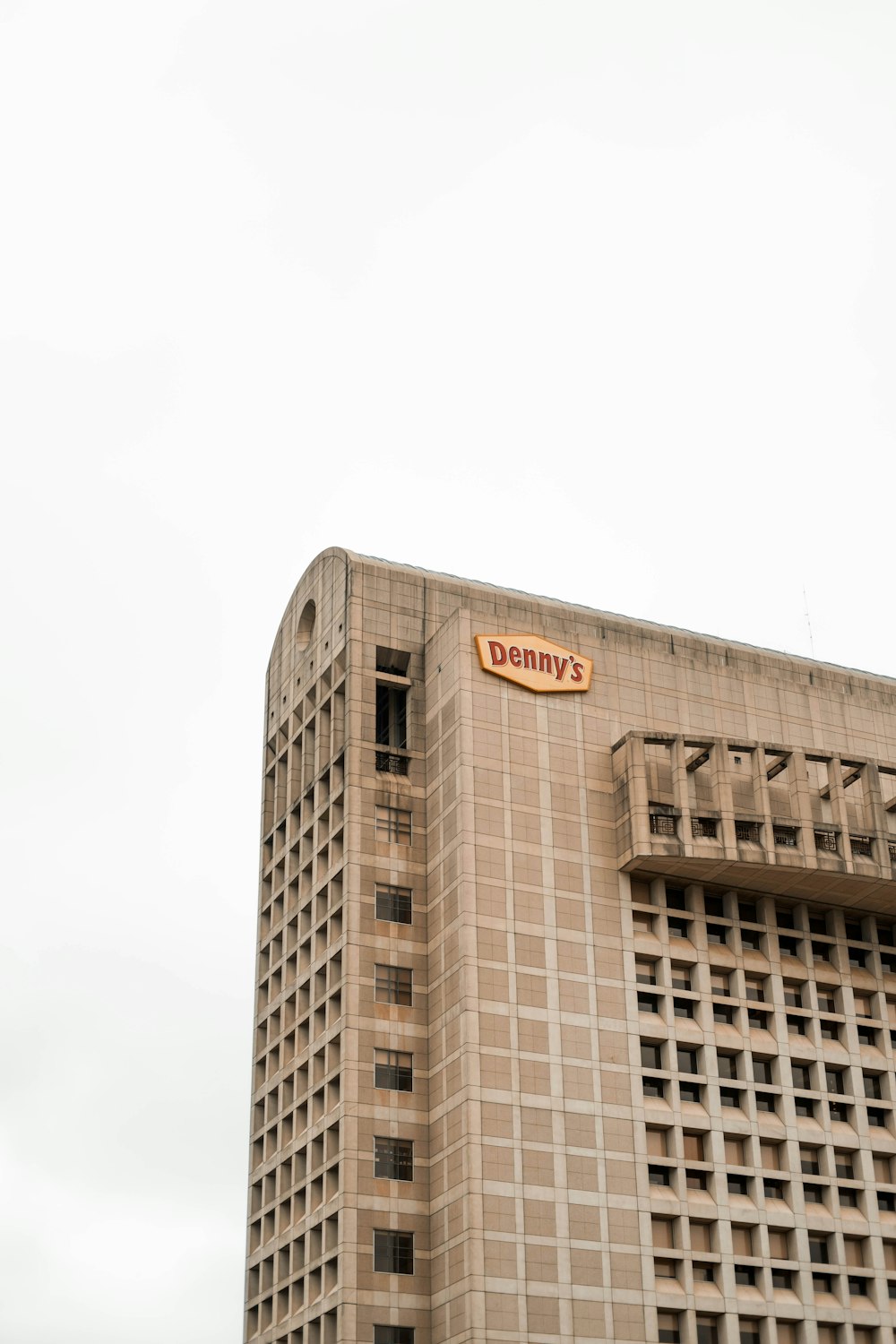 a tall building with a sign on it