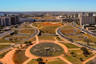 a large park with a circular structure in the middle