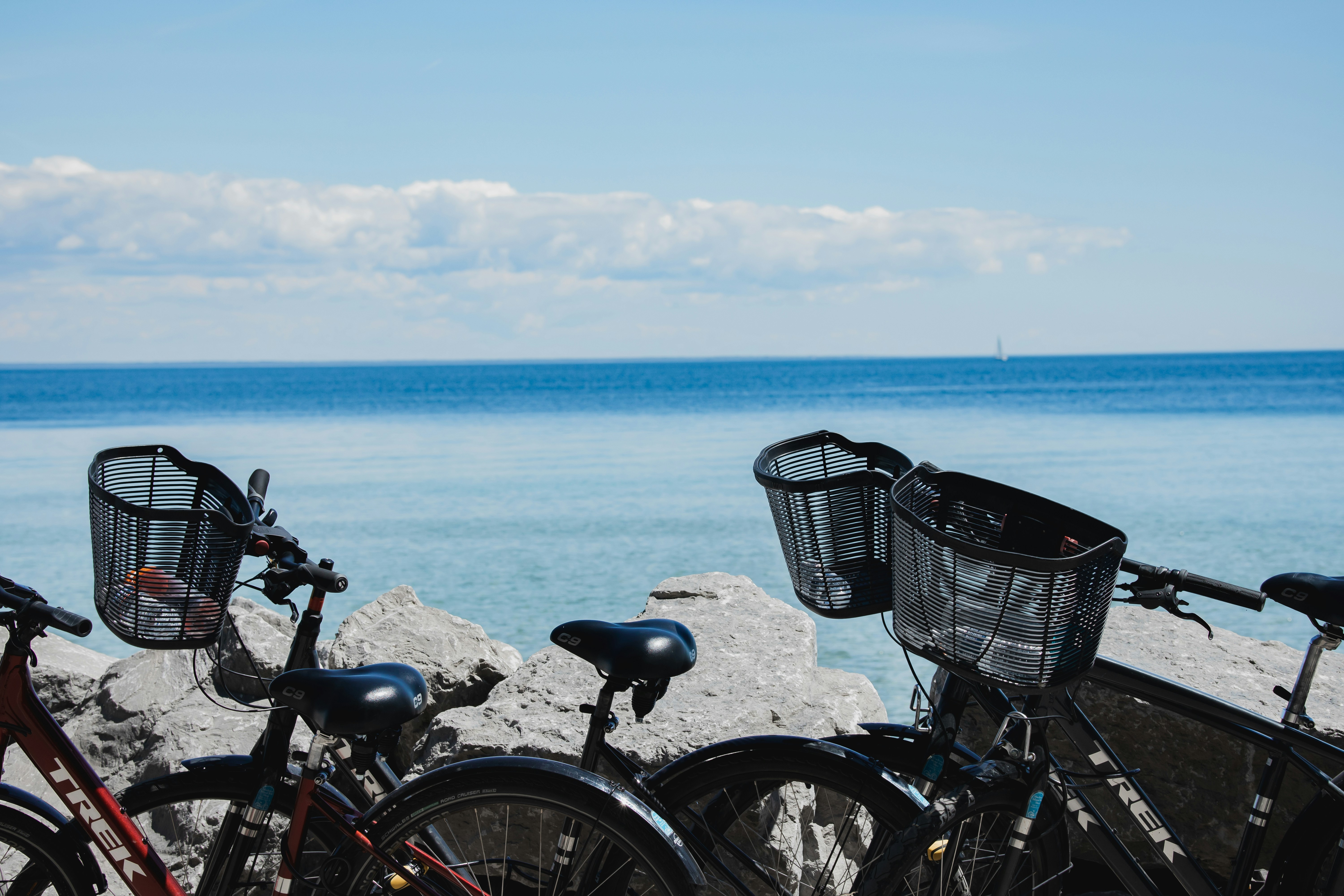 bicycles parked on a beach