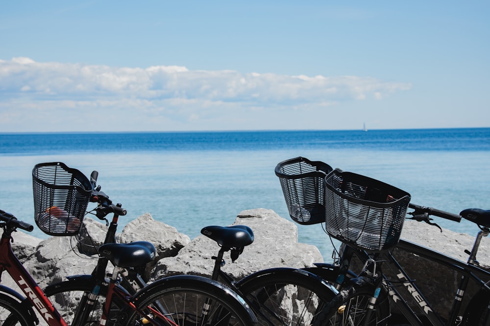 bicycles parked on a beach