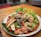 A vibrant seafood dish beautifully presented on a table.