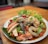 A vibrant seafood dish beautifully presented on a table.