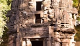 An ancient temple ruin bathed in warm sunlight with intricate stone textures.