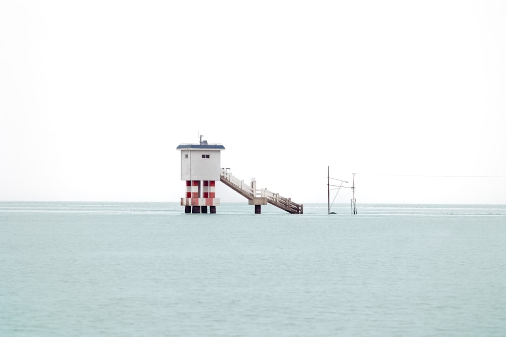 a lighthouse on a pier