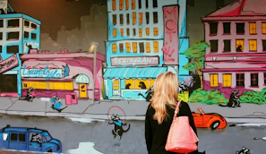 Colorful wall art adding a lively vibe to the laundromat space