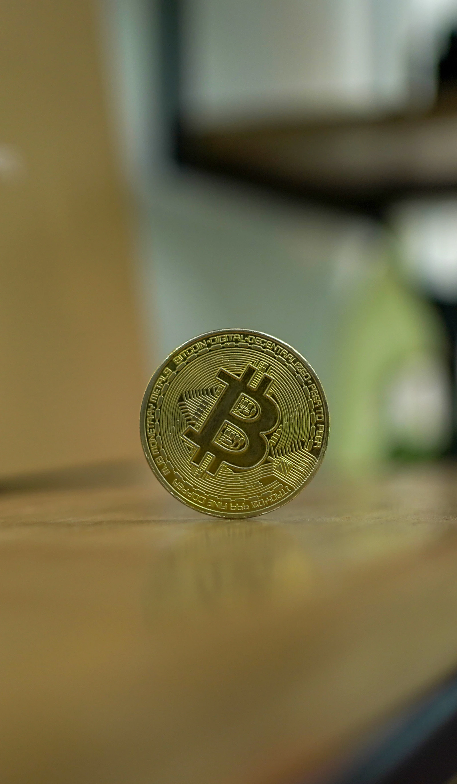 A physical gold Bitcoin coin