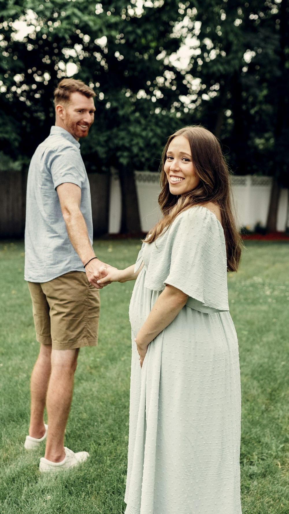 a man and woman holding hands