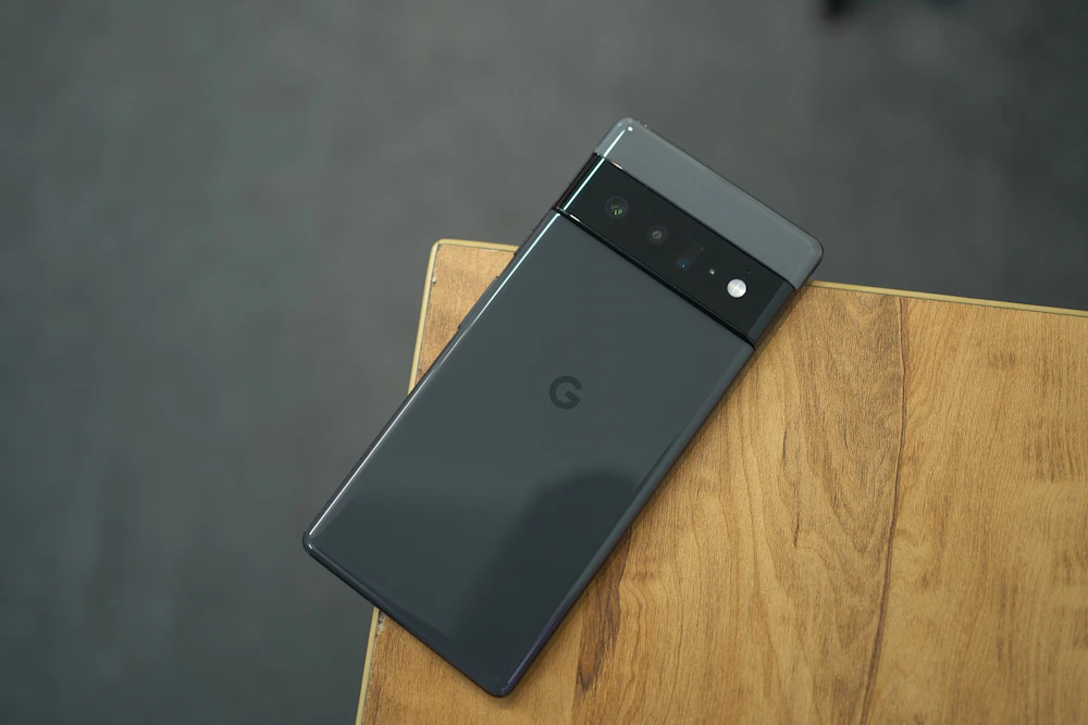 Google Pixel handset on a wooden surface