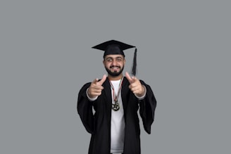 a person wearing a graduation cap and gown