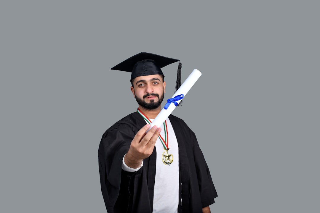a man wearing a graduation cap and gown holding a diploma, Download Mega Bundle of 5,000+ awesome stock photos with commercial license With 16 categories | Perfect for websites, ads and marketing campaigns in South Asian countries.</p>
<p></p>
<p>Get access at 50% discount on https://fotos.pk/