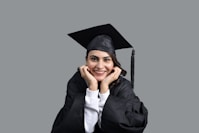 a person wearing a graduation cap and gown