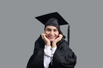 a person wearing a graduation cap and gown