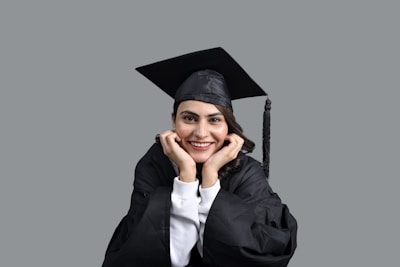 a person wearing a graduation cap and gown