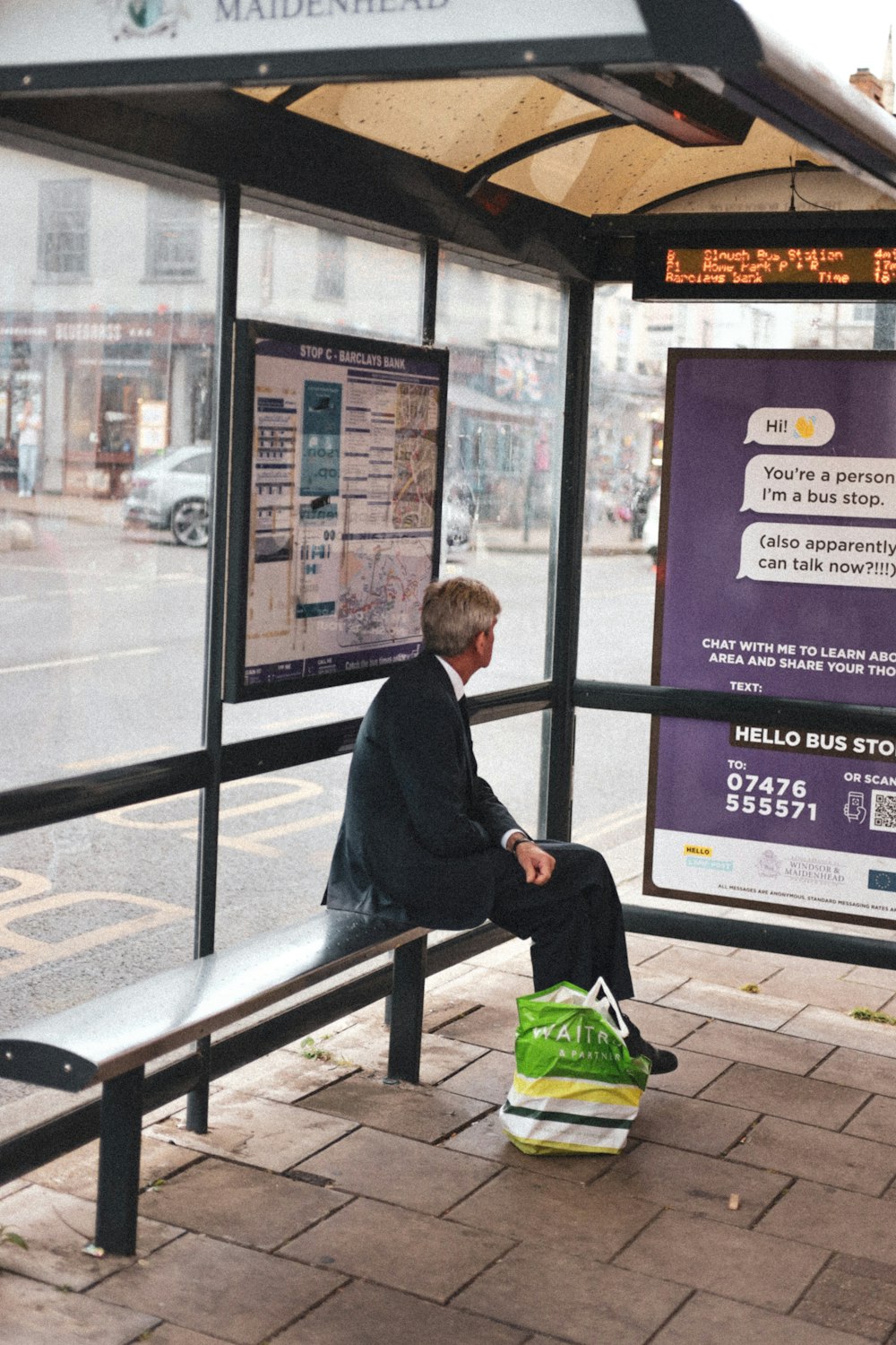 a man sitting on a bench