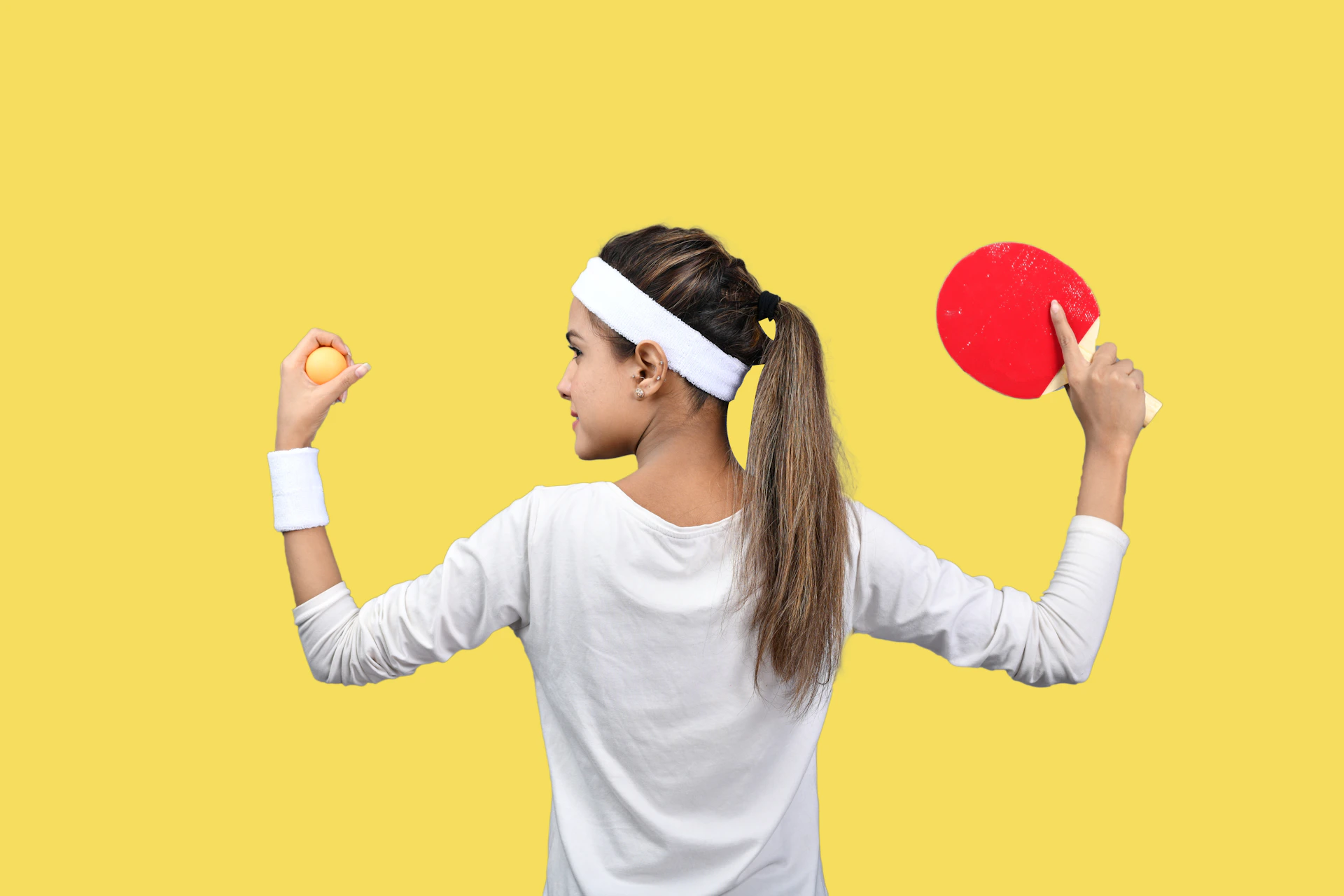 a person holding a red balloon