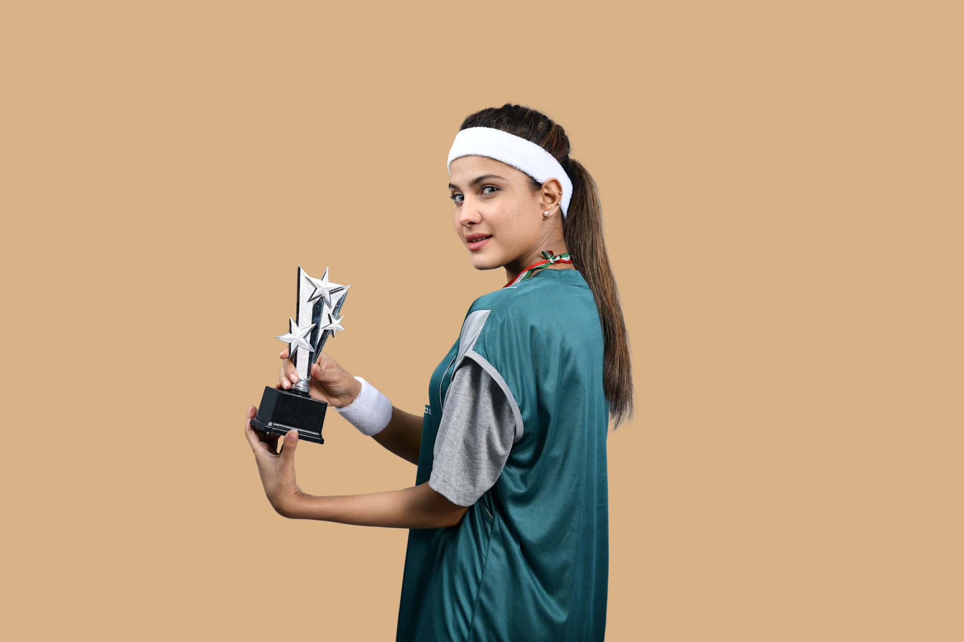 a person holding a trophy