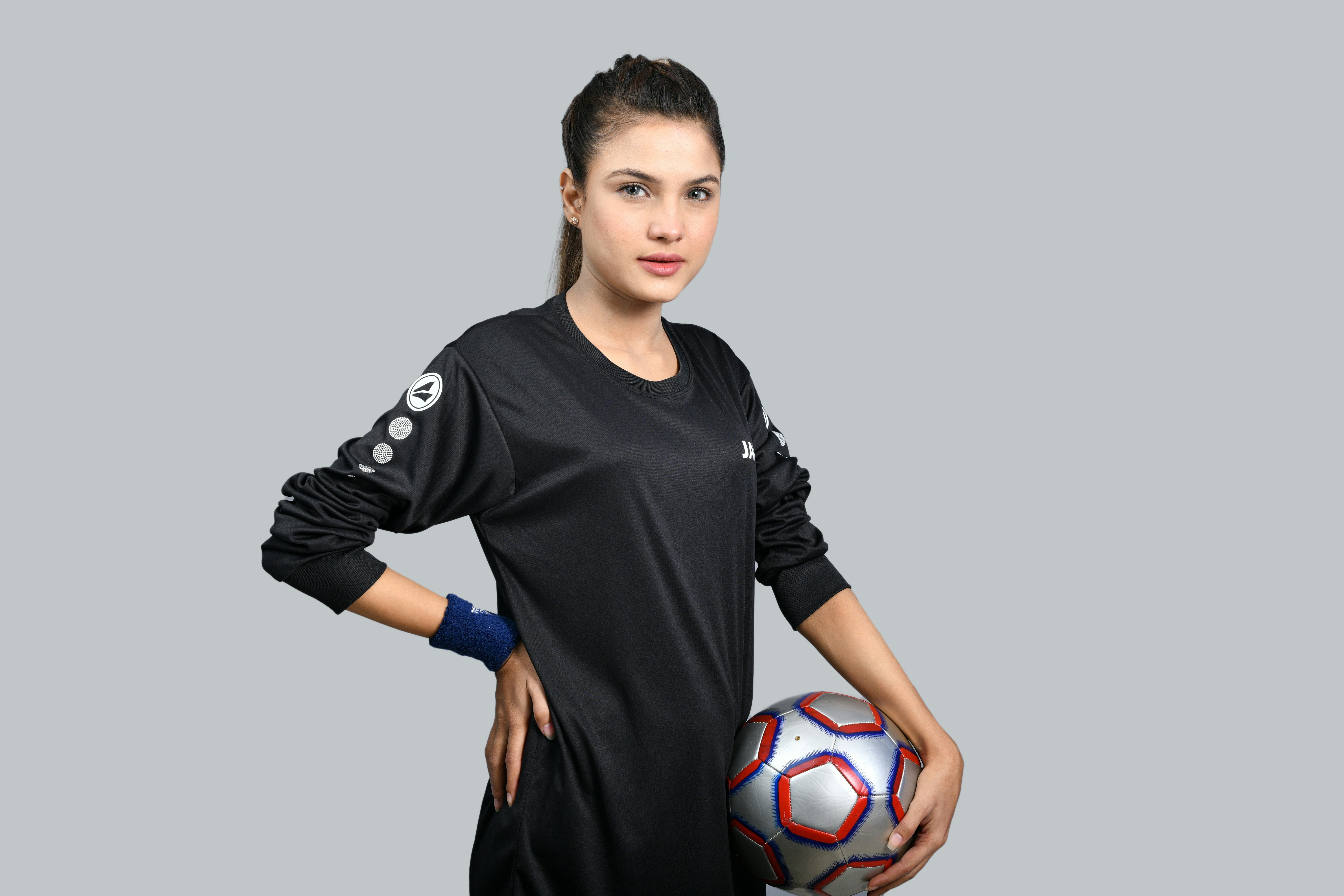 a person holding a ball