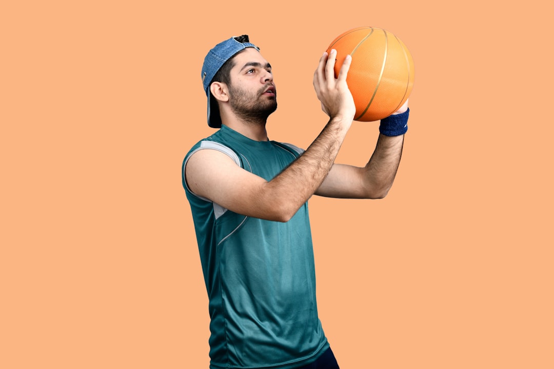a man with a ball, Download Mega Bundle of 5,000+ awesome stock photos with commercial license With 16 categories | Perfect for websites, ads and marketing campaigns in South Asian countries.<p></figure>Get access at 50% discount on https://fotos.pk/