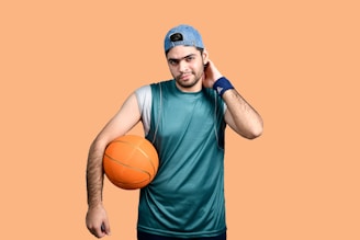 Close-up of basketball player adjusting a compression arm sleeve