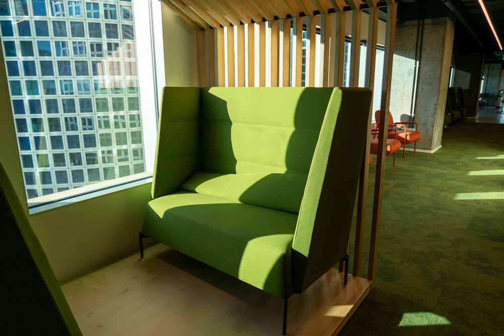 a green couch in a room