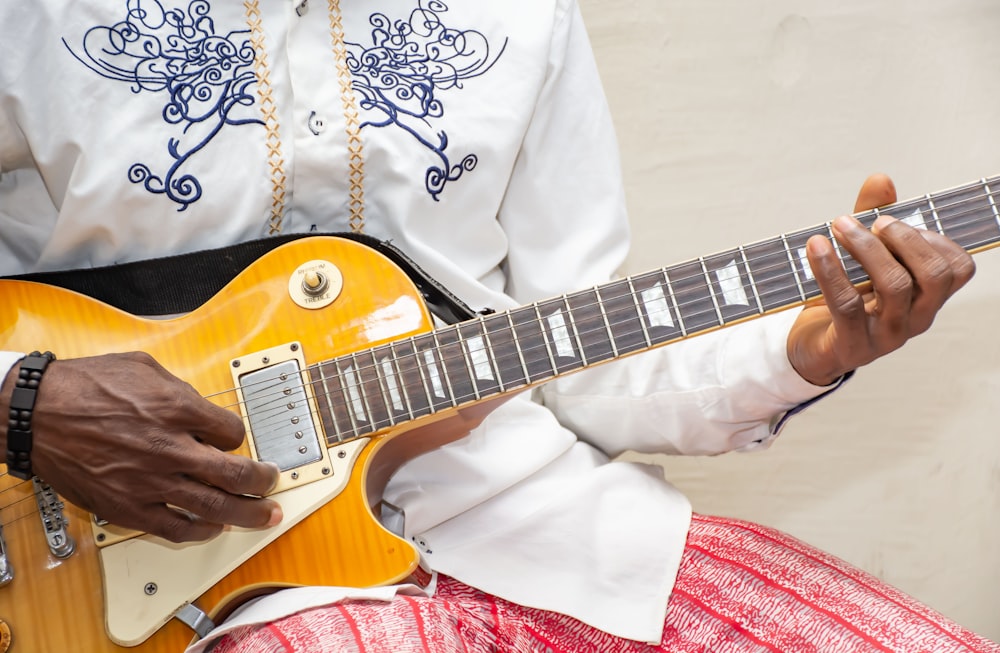 a person playing a guitar