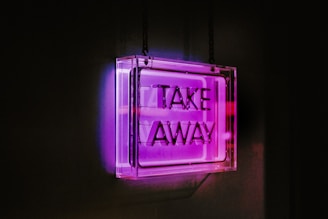 a purple light in a dark room