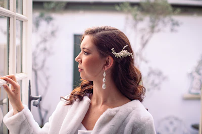 a woman with a flower in her hair