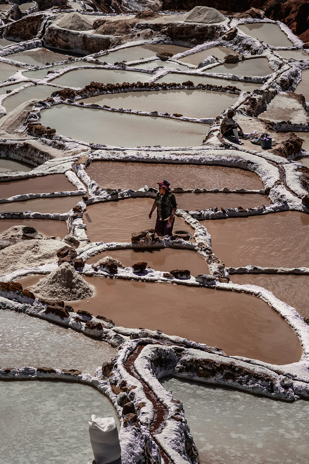 a person standing on a rock