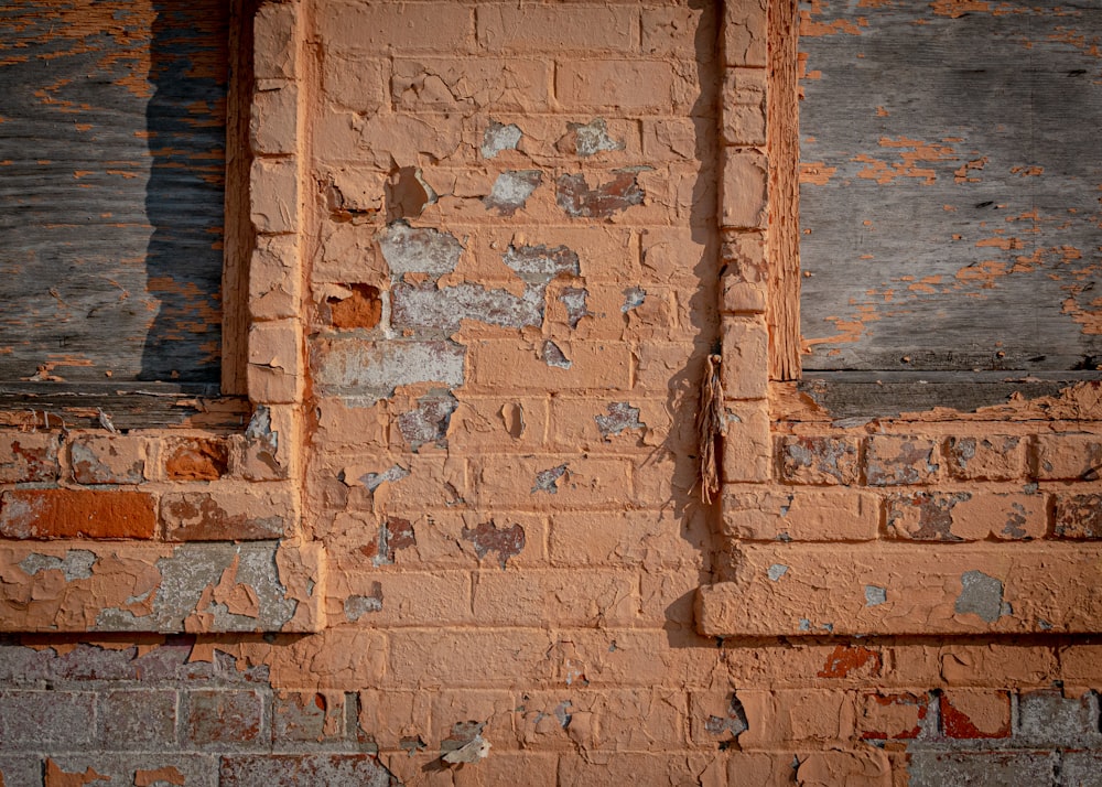 a brick wall with a hole in it