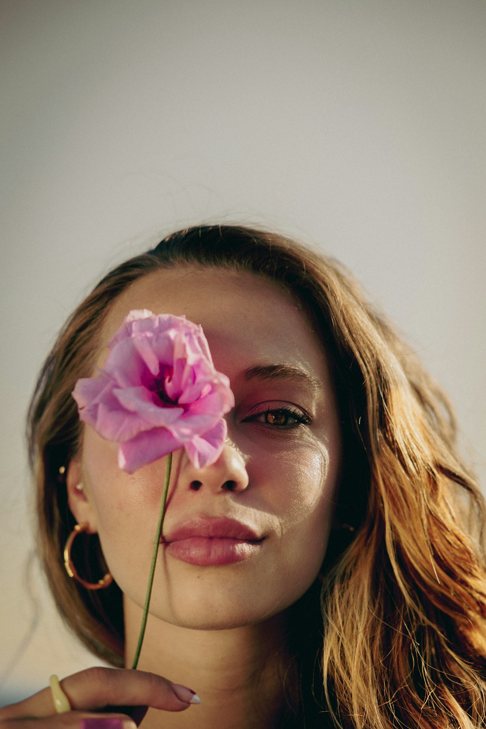 a woman with a flower in her hair