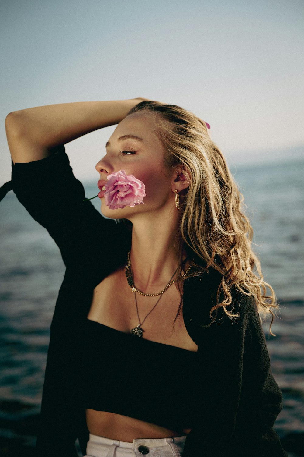 a woman with a flower in her hair