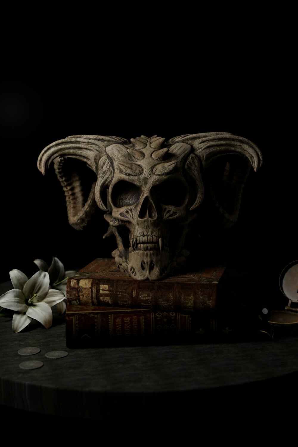 a skull with a flower on a table