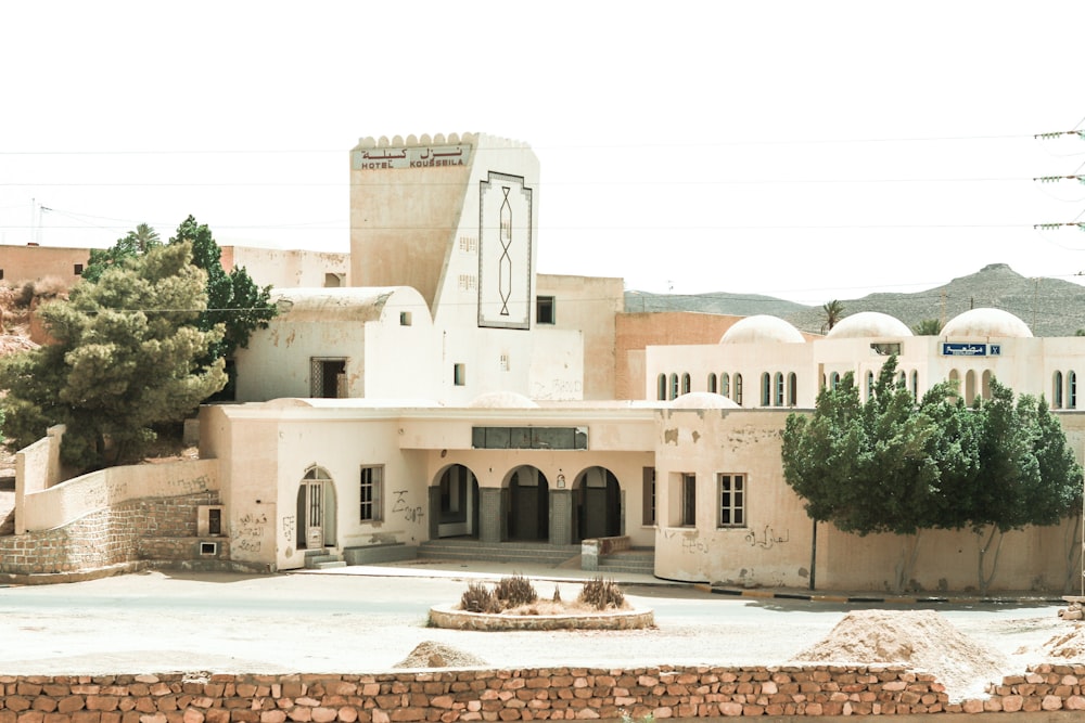 a white building with a dome roof