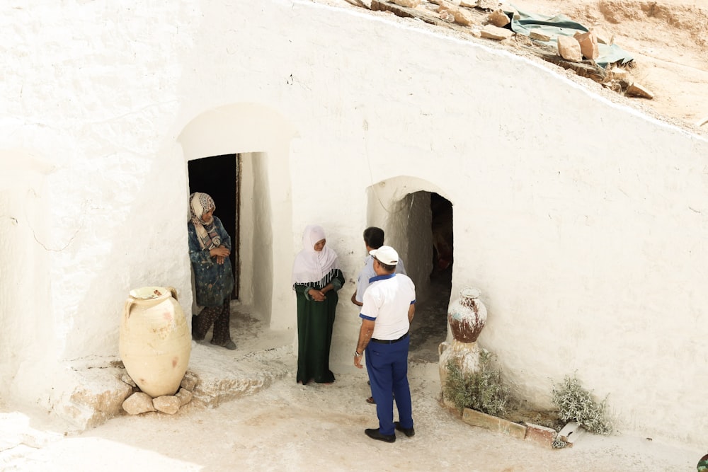 a few women standing in a doorway