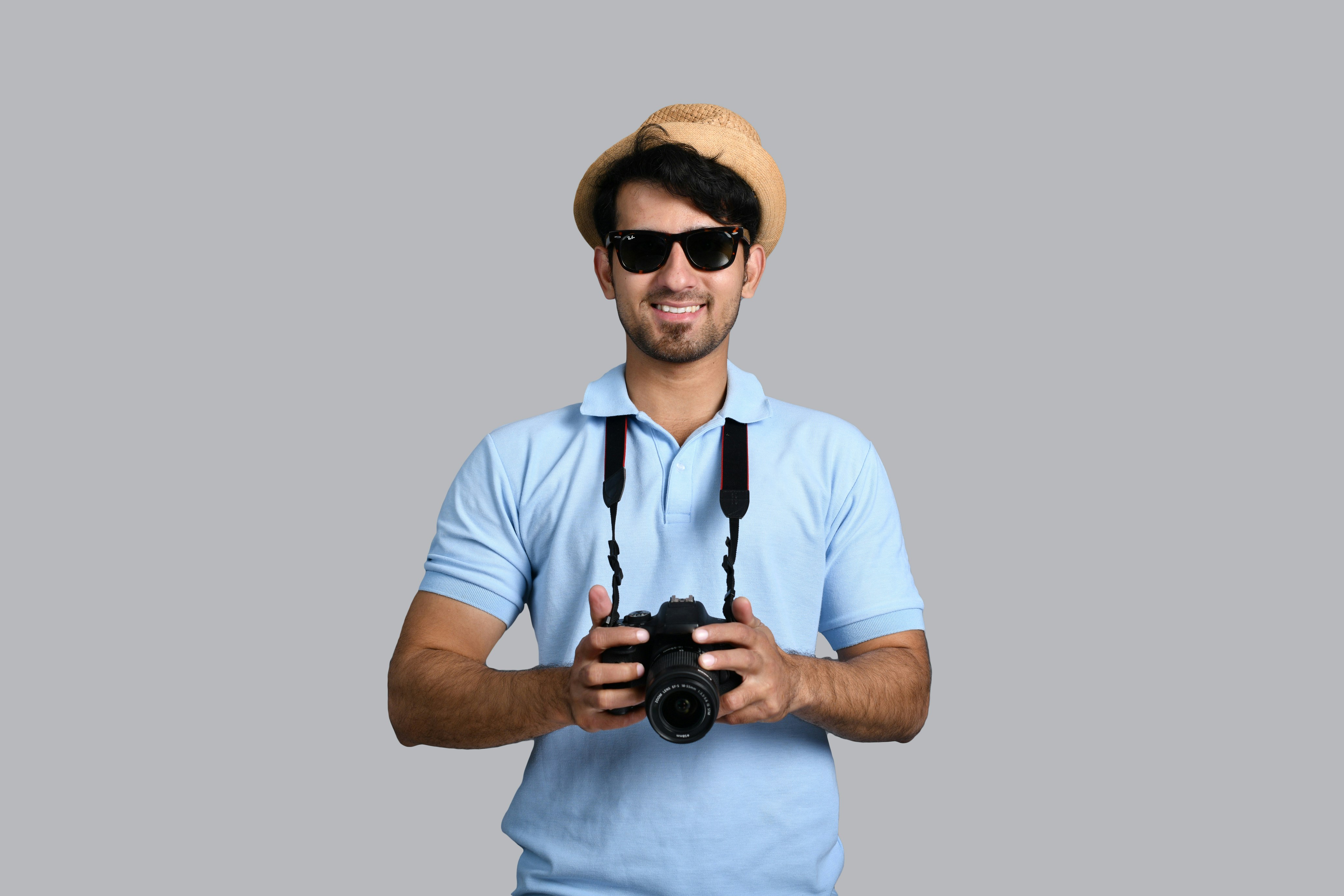 a man holding a camera