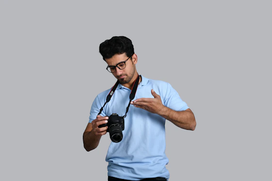 a man holding a camera