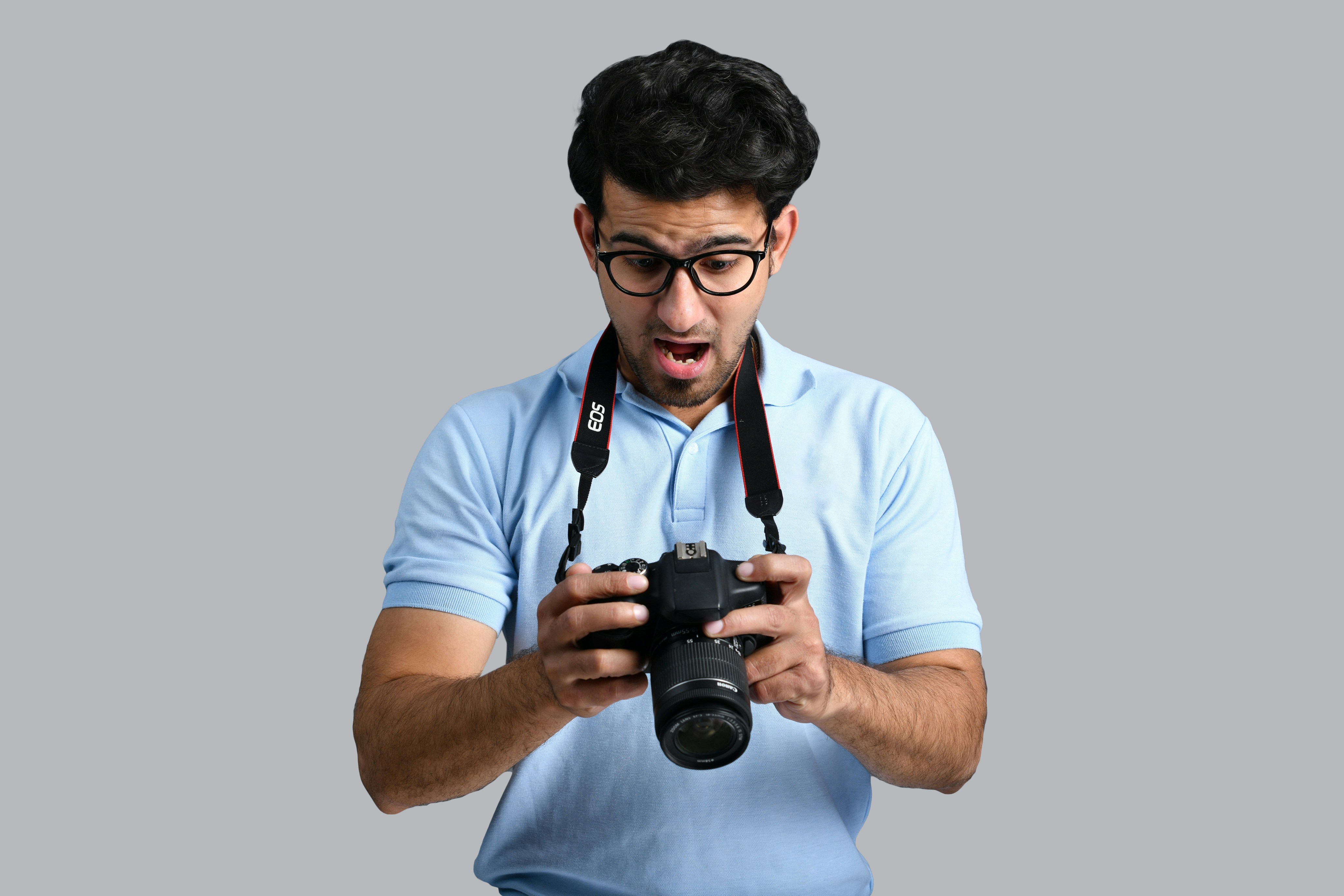 a man holding a camera