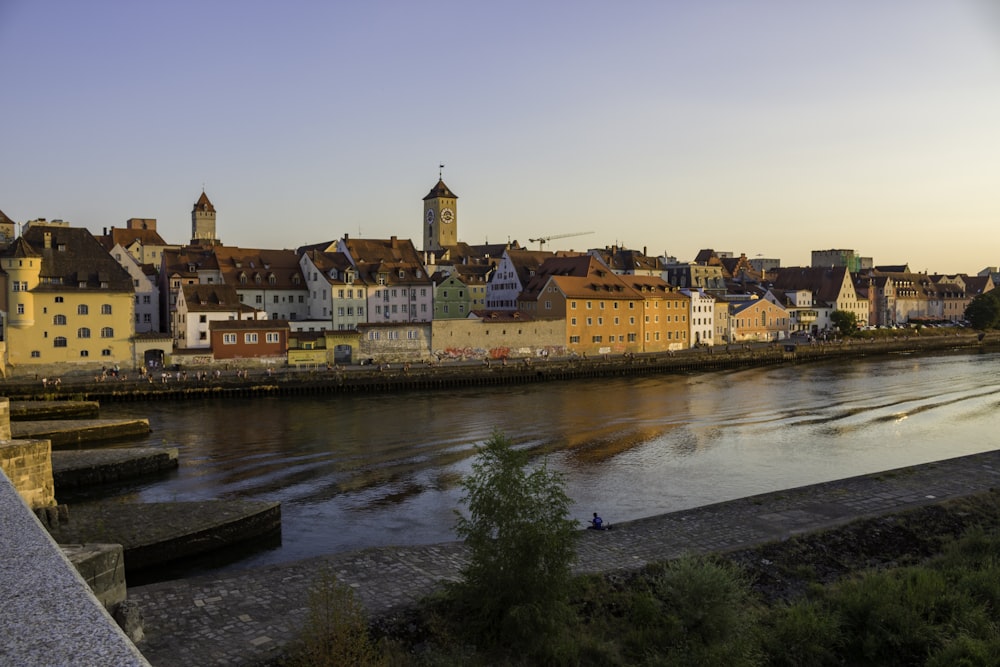 a body of water with buildings along it