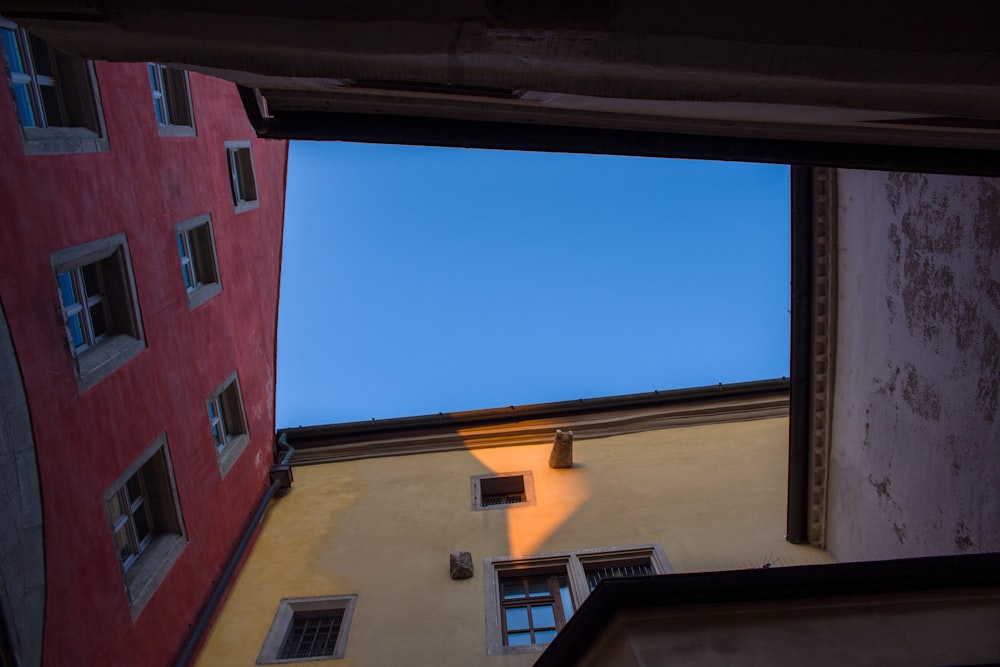 a view of a blue sky through a window of a building