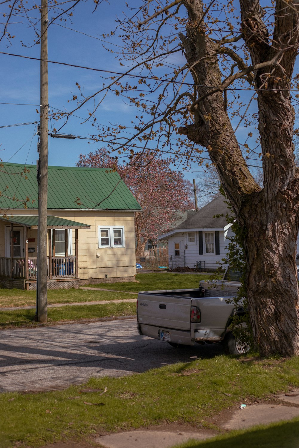 a truck parked in front of a house